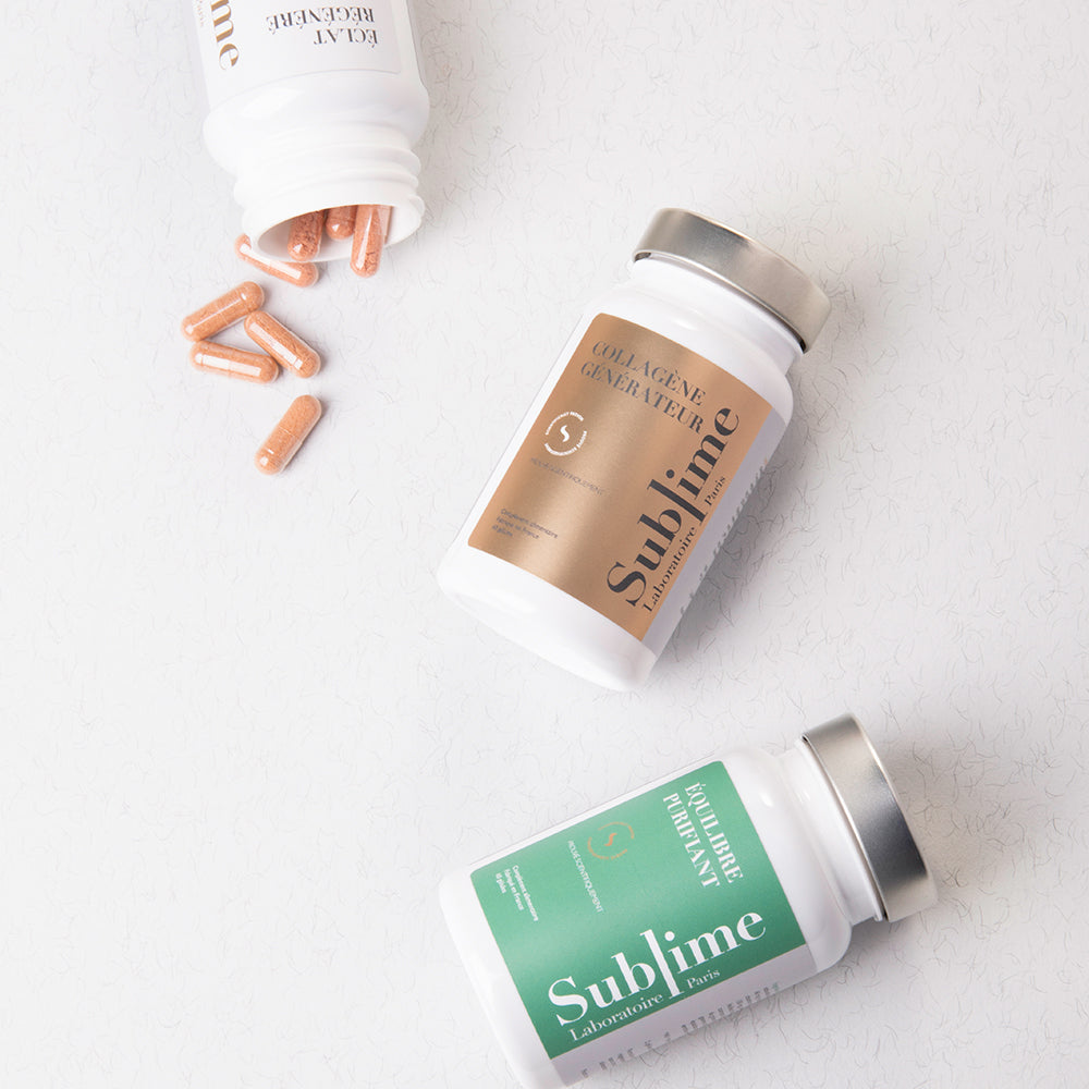 Laboratoire Sublime Purifying Balance and Rejuva Collagen supplement bottles with capsules, French detox and collagen beauty formulas, flat lay on white background.