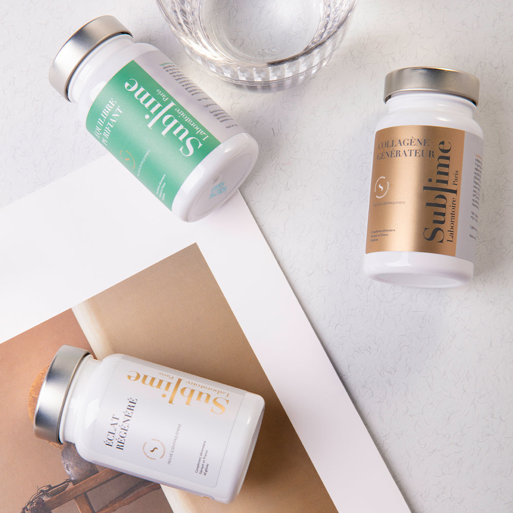 Three Laboratoire Sublime supplement bottles, Rejuva Collagen, Regenerated Radiance, and Purifying Balance, arranged on a clean flat lay.